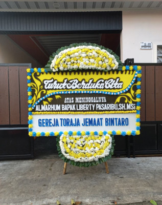 Papan Bunga Duka di Banama Tingang